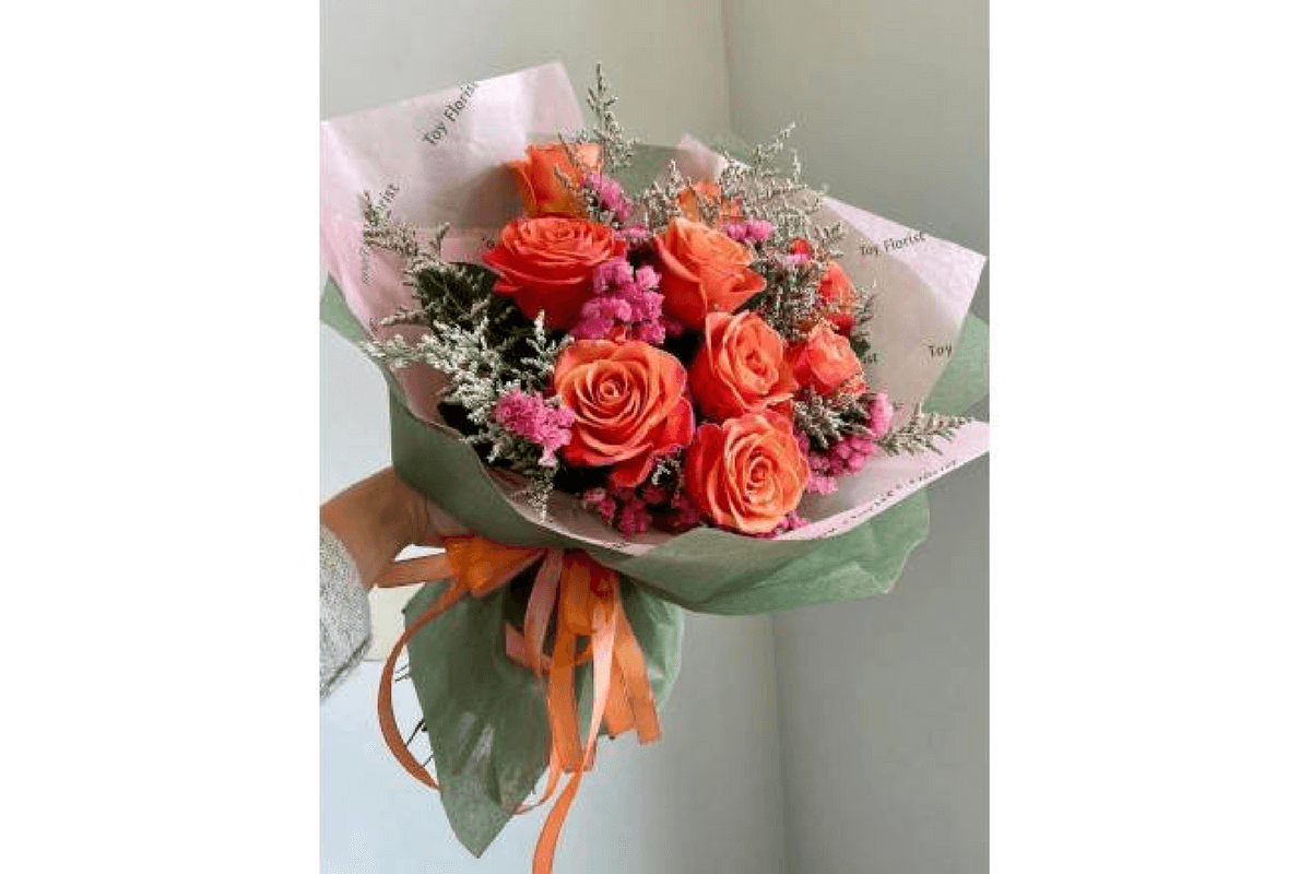 Orange Crush Twelve Stem Premium Long-Stem Orange Roses