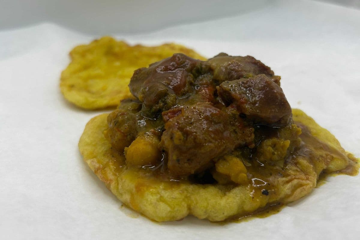 Doubles w/Curry Goat
