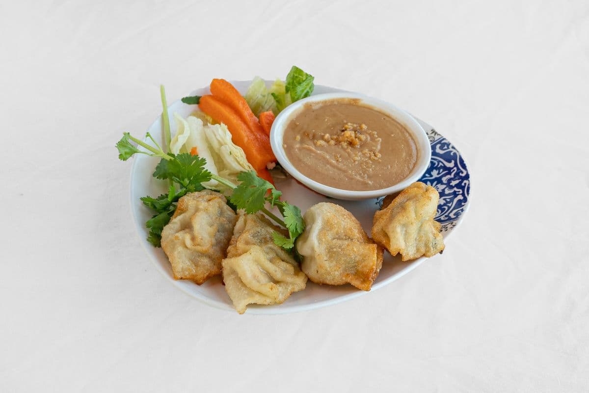 Raviolis au poulet et fromage (4 mcx) / Cheese and chicken dumplings (4 pcs)