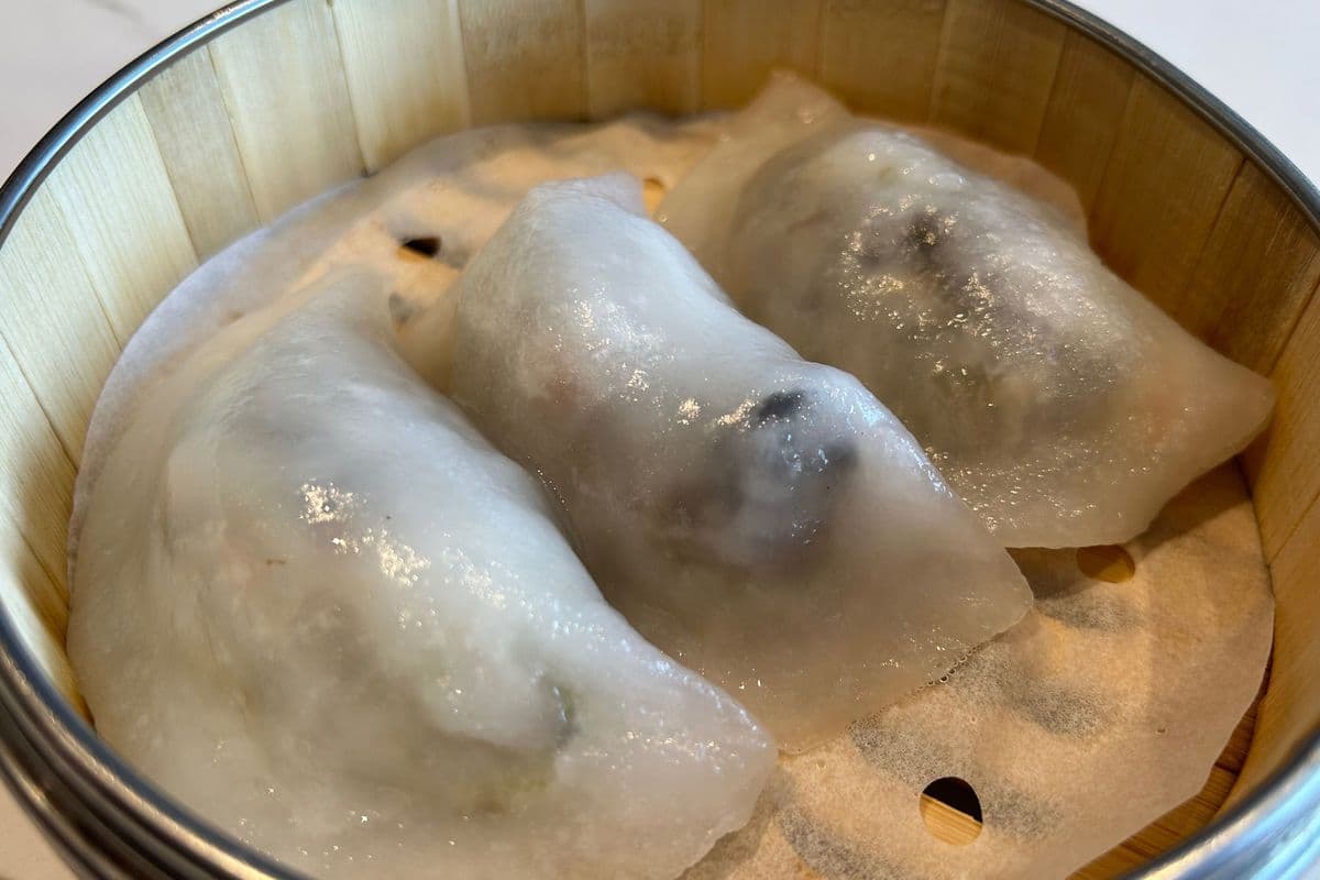 S10. Black Truffle Sauce Mushroom Dumplings