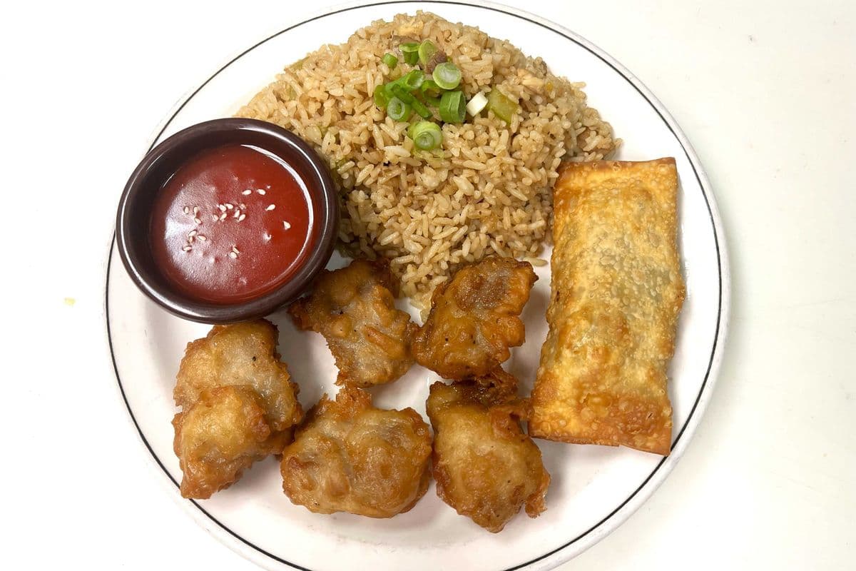 Sweet And Sour Spareribs Daily with chicken fried rice and egg roll . No Substitution