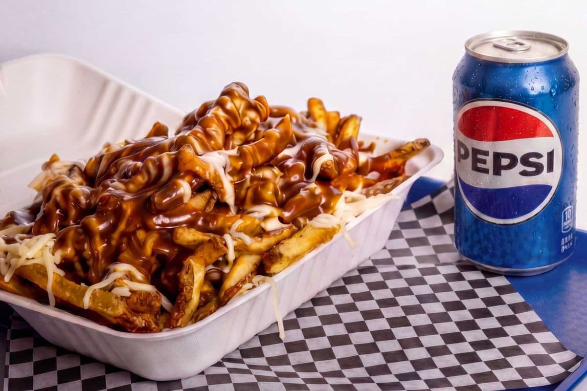 $10 Lunch Deal - LARGE Poutine + Canned drink