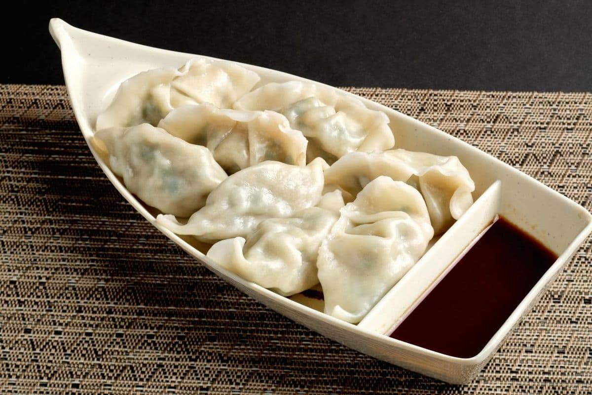 Pork & Chives Dumplings 干捞猪肉韭菜饺	(10)