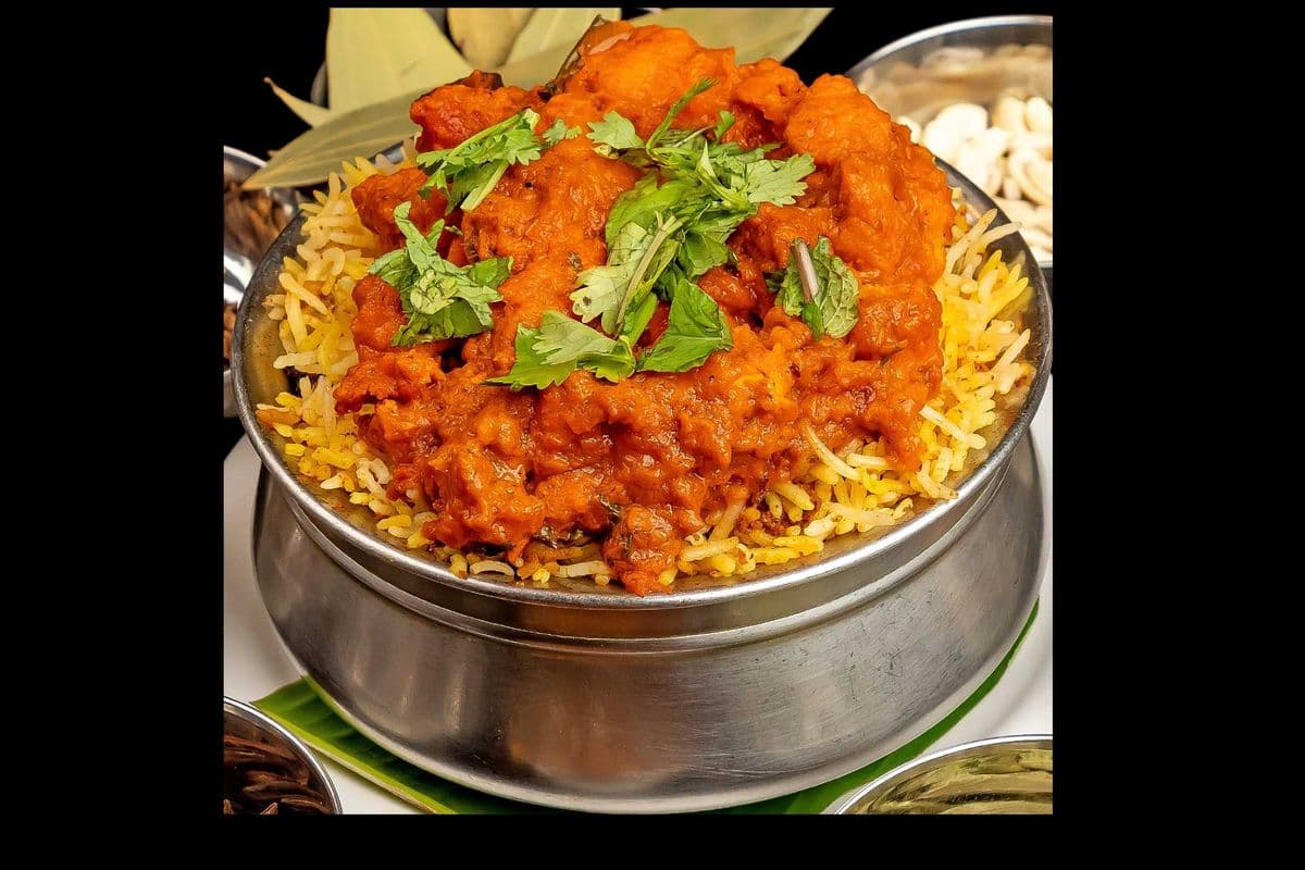 Mutton Ghee Roast Biryani with Pop or Badam Milk (24 oz)