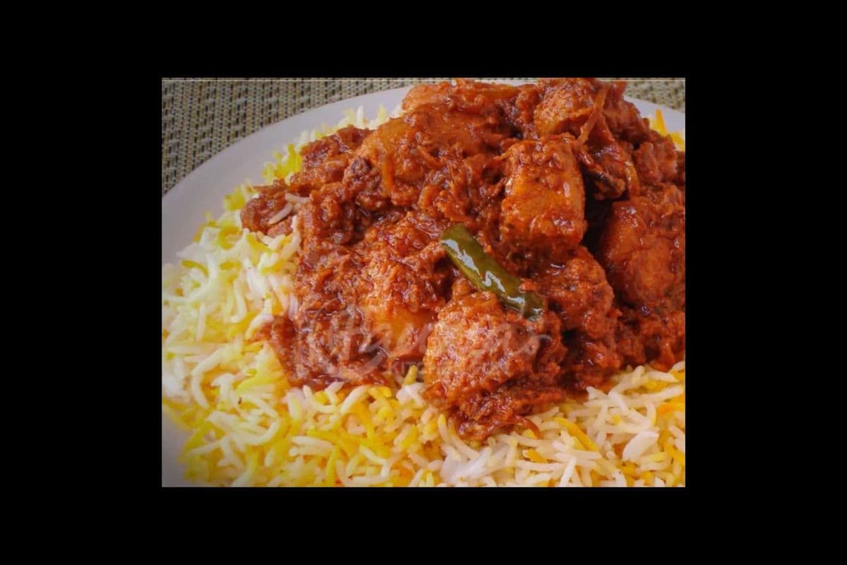 Chicken 65 Biryani with Pop or Badam Milk (24 oz)