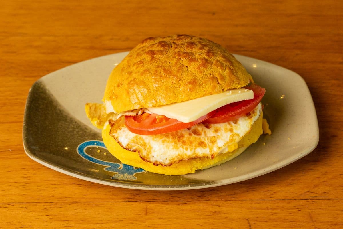 A4. Signature Pineapple Bun with Tomatoes, Egg, and Butter