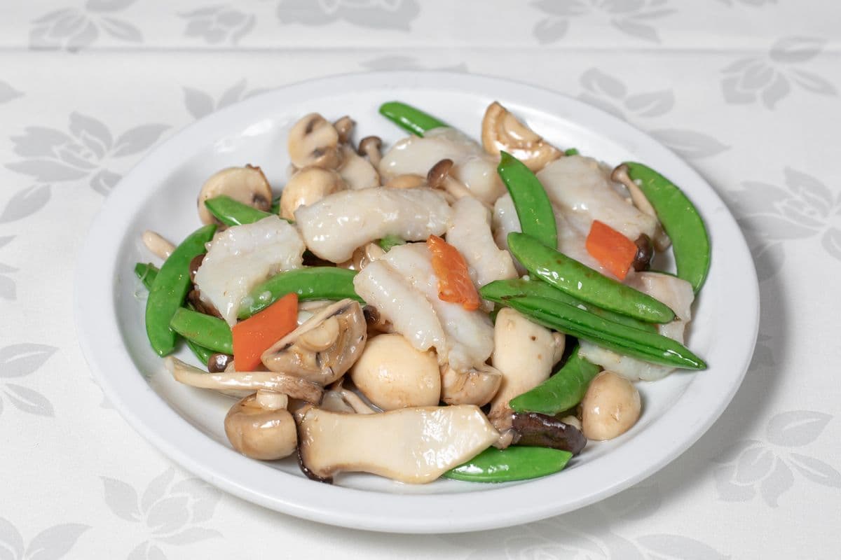 59. Sauteed Grouper with Snap Peas and Assorted Mushrooms