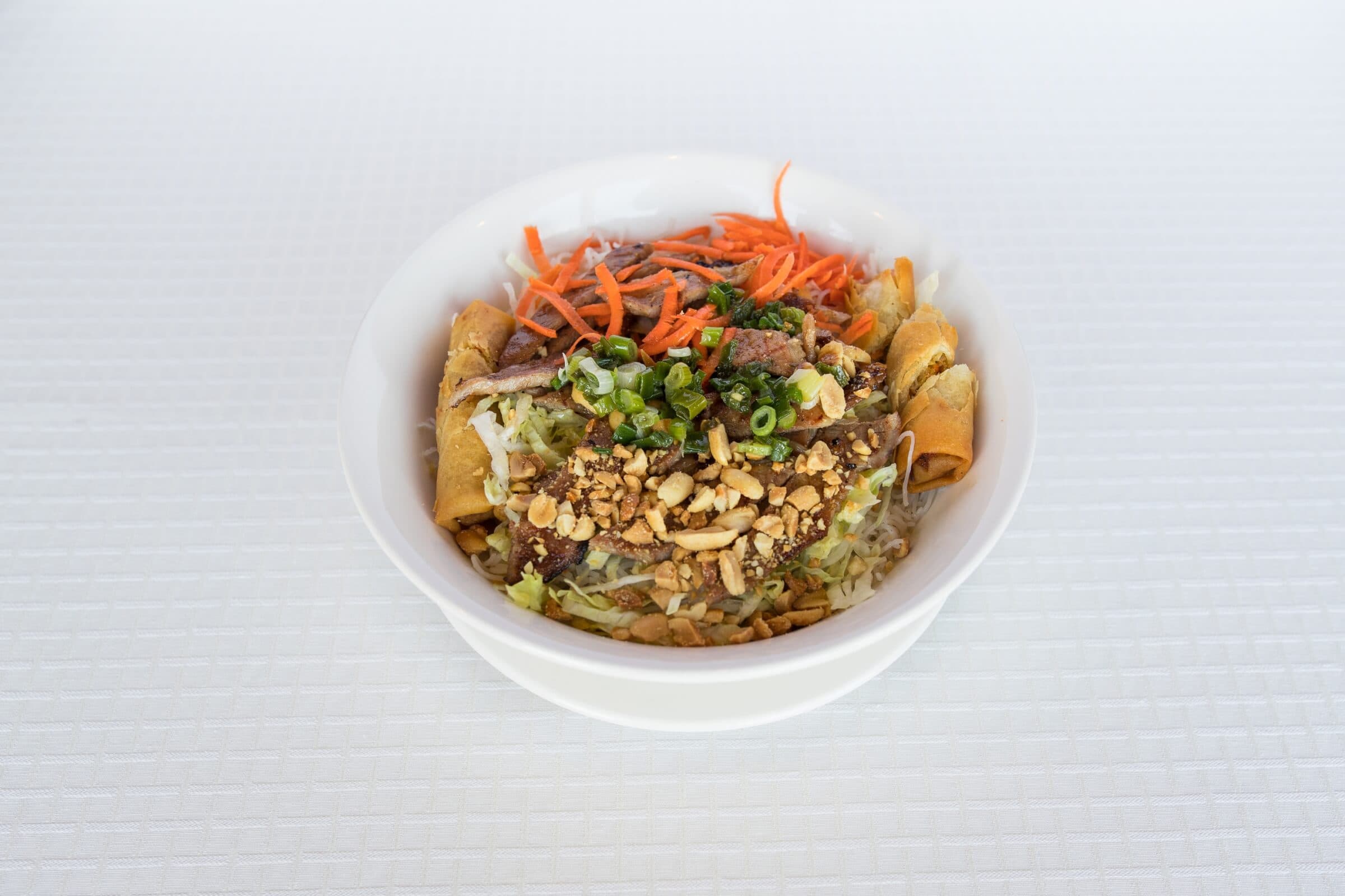 21. Charbroiled Pork and Spring Rolls on Rice Vermicelli