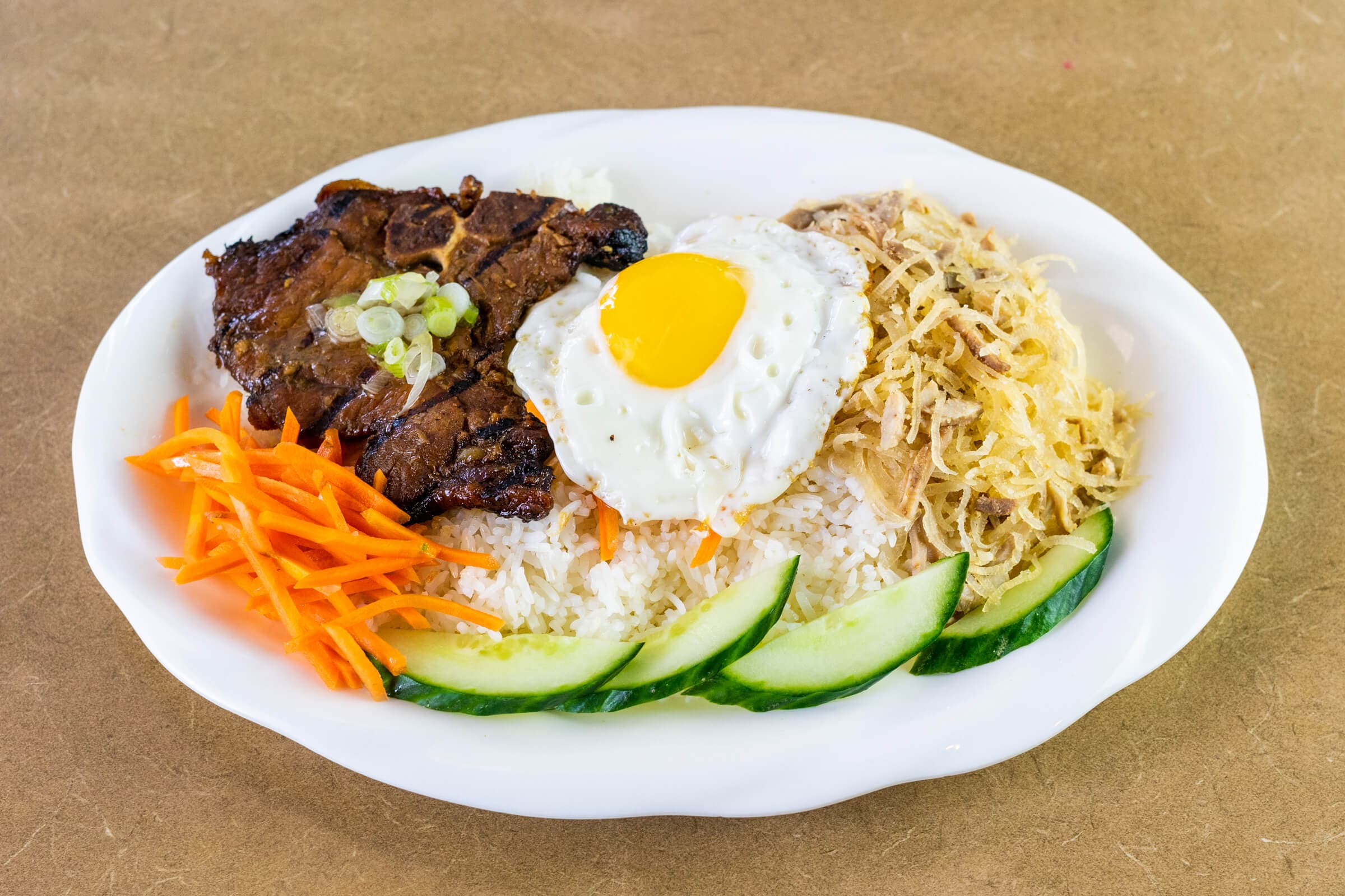 69. Shredded Pork, Egg, and Grilled Pork Chop on Steamed Rice