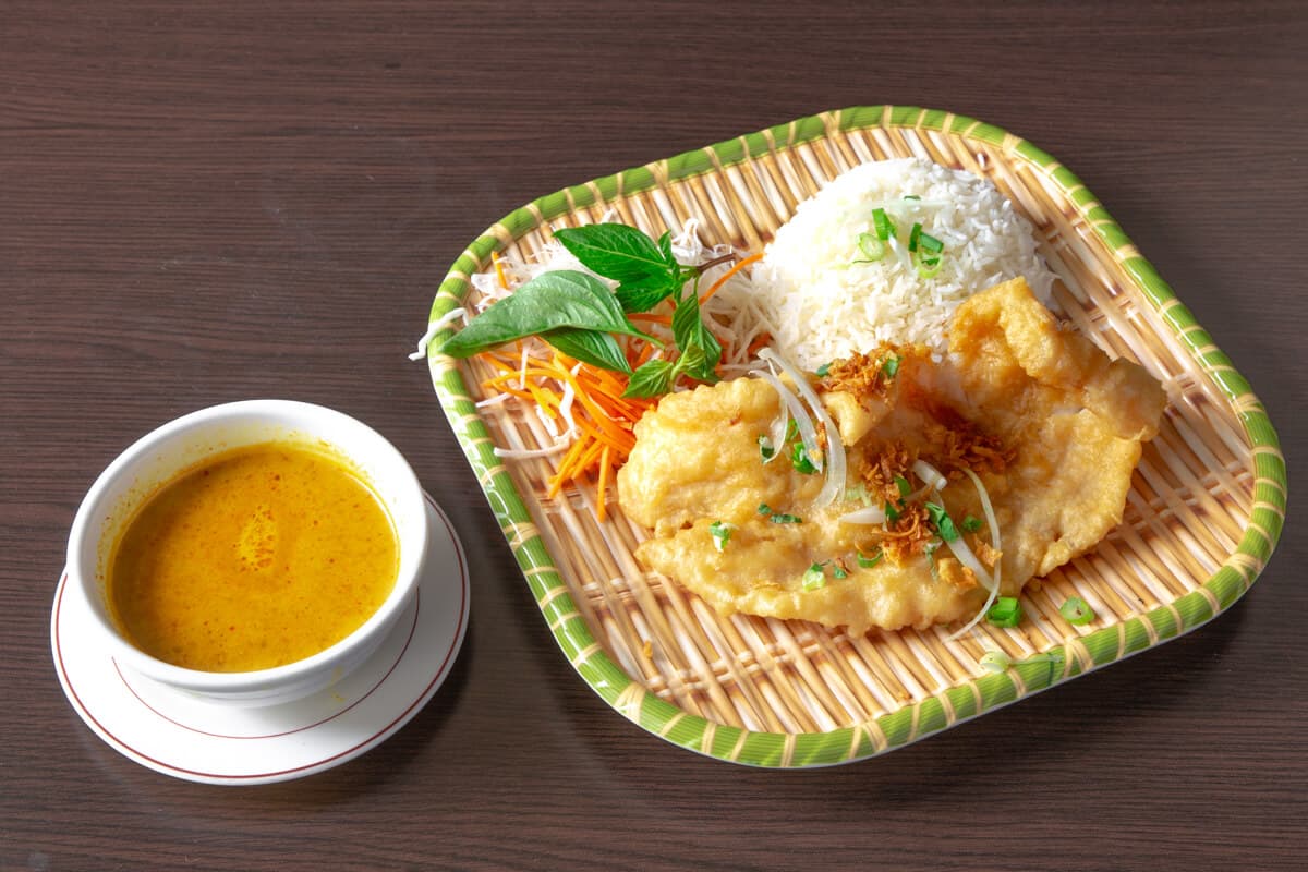 4. Fried Sea Bass in Chef's Special Sauce Topped with Peppers