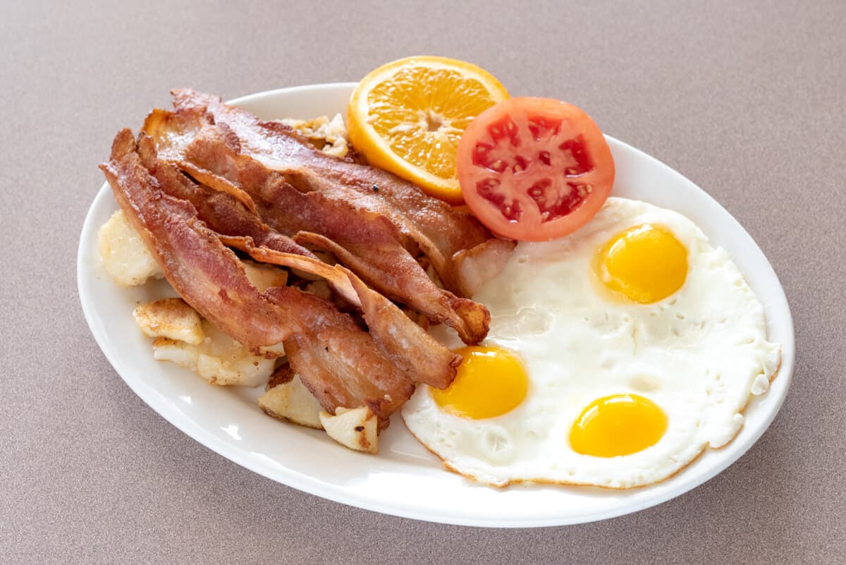 Three Eggs with Choice of Ham, Bacon, or Sausage