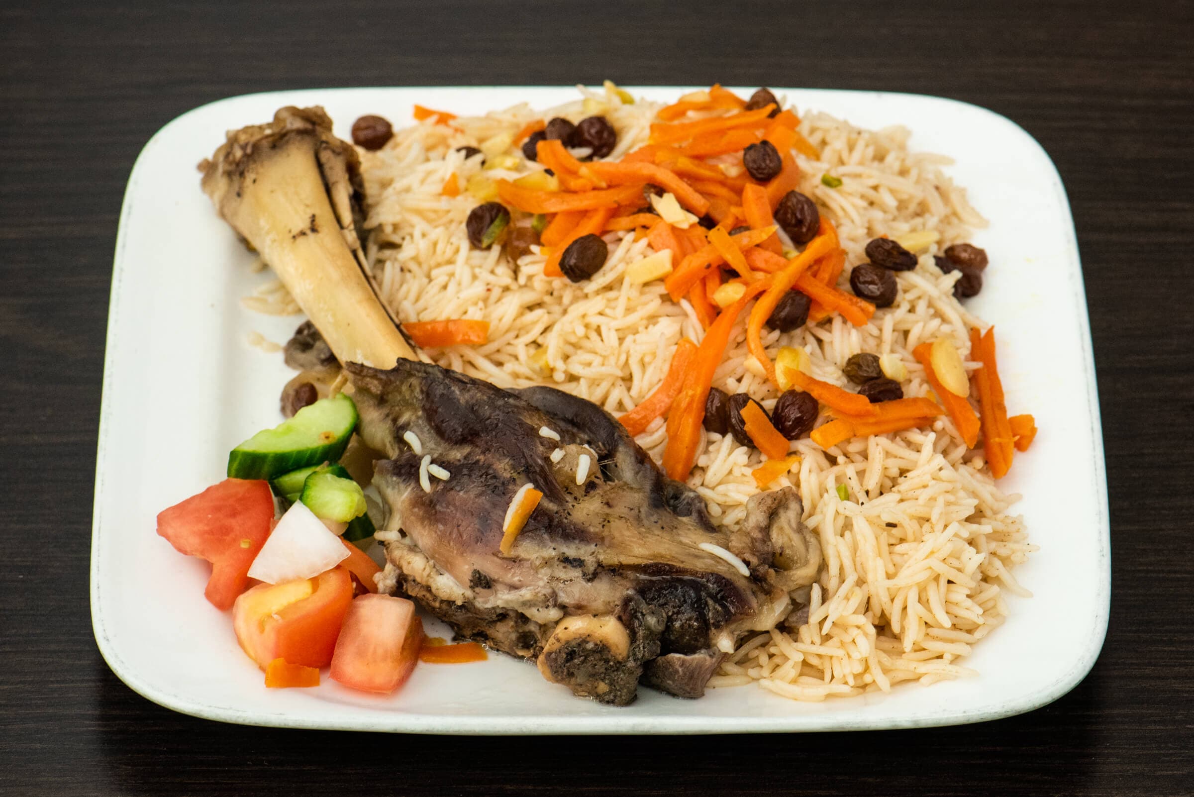 Lamb Shank with Salad and Naan