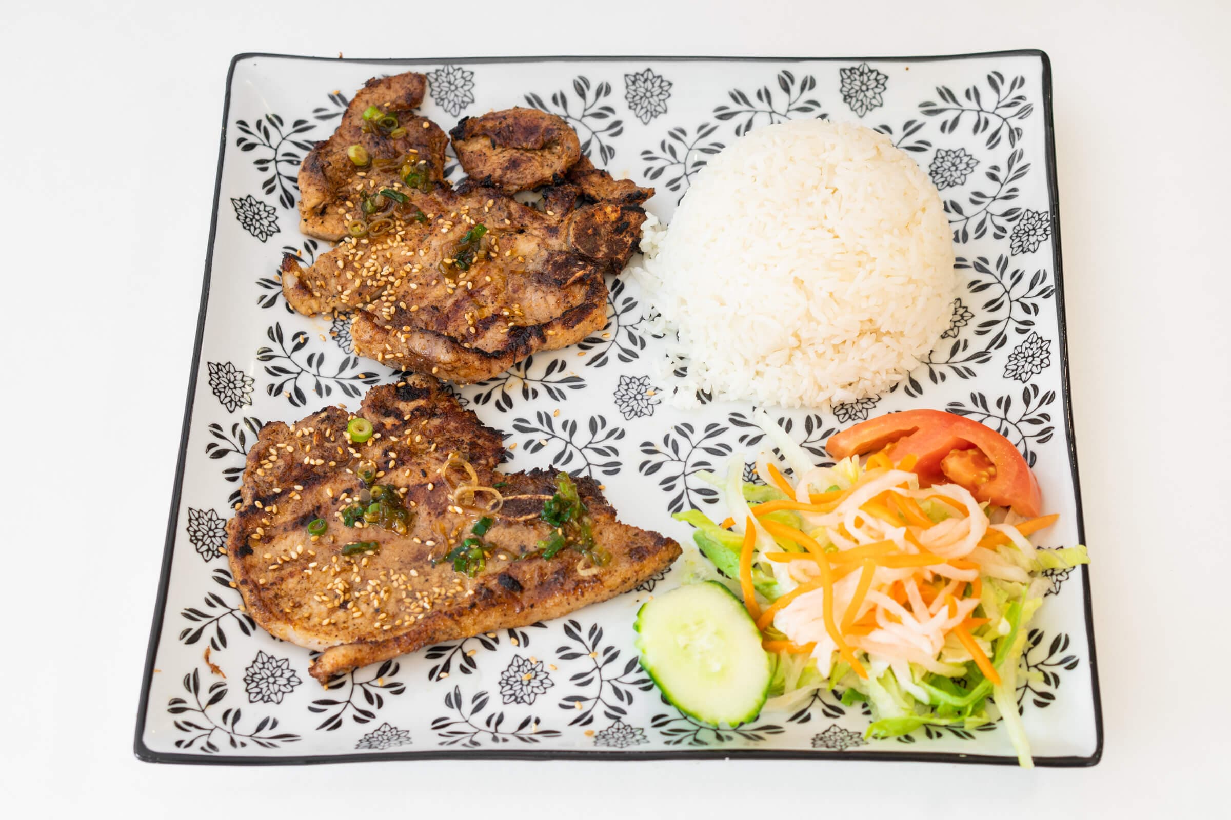 63. Grilled Lemongrass Pork Chop on Rice - Com Suon Nuong