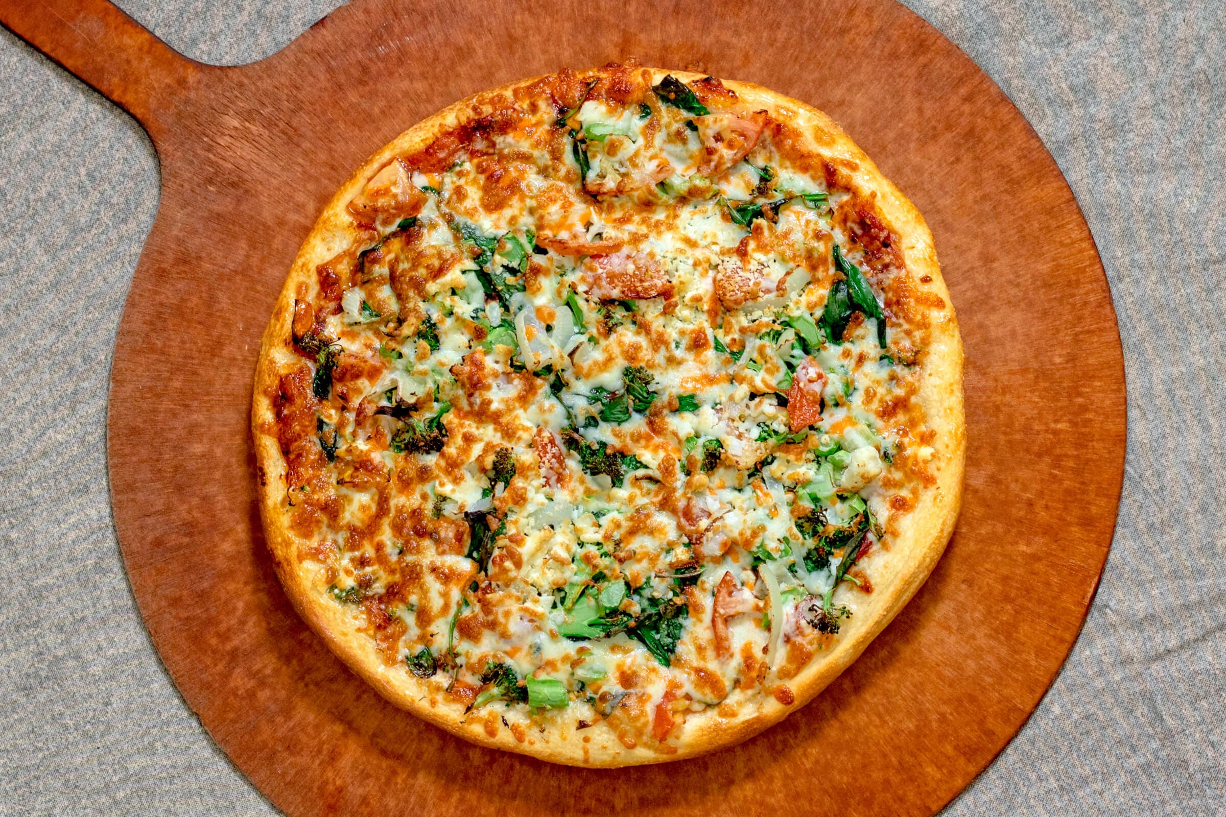Two Medium Broccoli and Spinach Pizzas