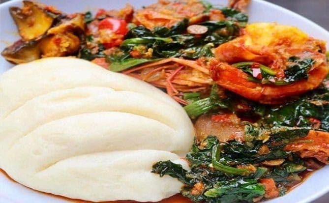 Pounded Yam and any Soup with Two Pieces of Meat or Fish