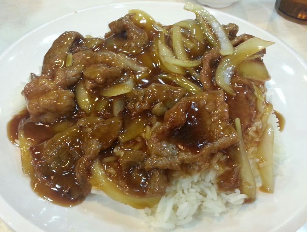 39. Pork Chop with Onion Sauce on Rice