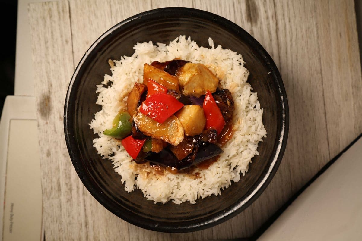Eggplant, Potato, and Peppers Over Rice Bowl