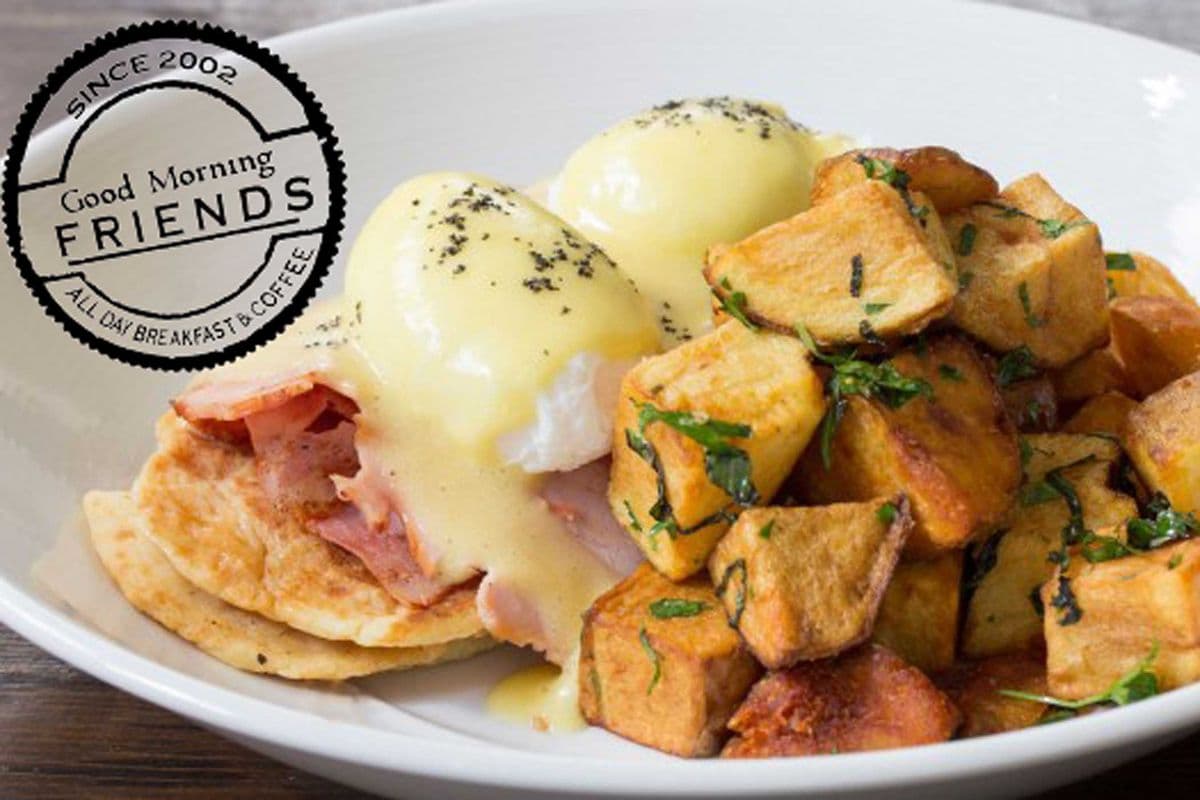 Eggs Benedict with Peameal and Skin on Wedge Fries