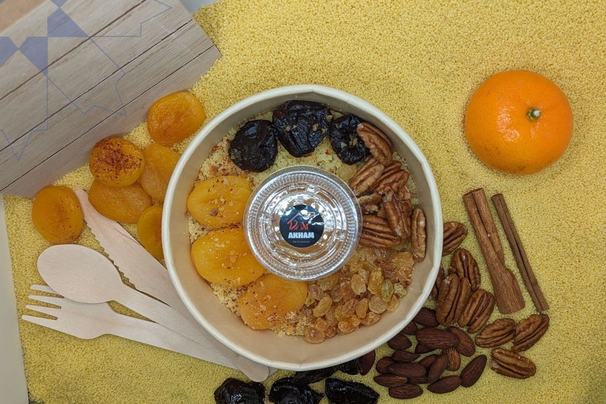 Seffa (couscous sucré aux amandes, prunes, abricots, et pacanes)