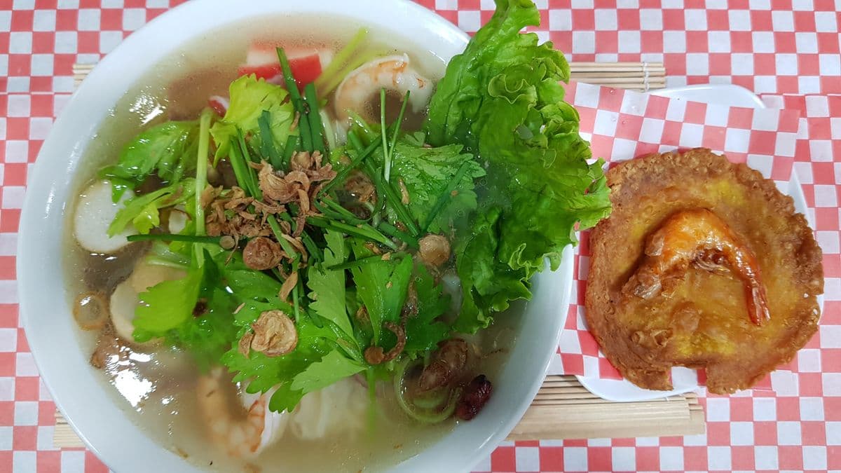 502. Rice and Egg Noodle Soup with Seafood, BBQ Pork, and Minced Pork