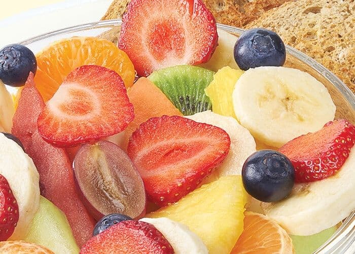 Large bowl of fresh fruit with toast (170 Cals.)