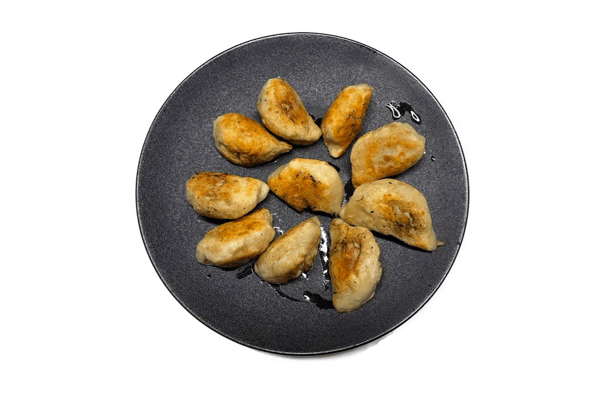 A5. Pork & Veggie Dumplings (10) 锅贴 (10)