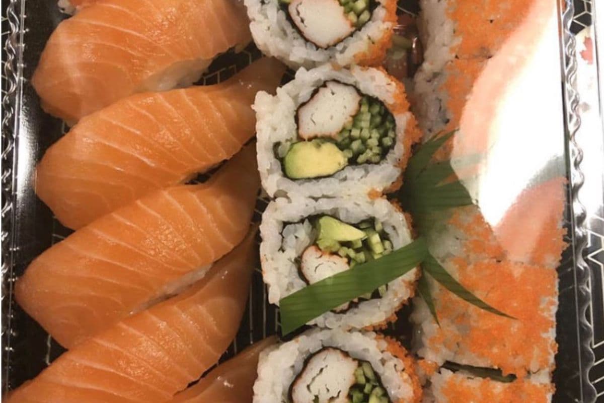 C11. Salmon Sushi (4 pcs), California Roll (6 pcs), Dynamite Roll (8pcs)