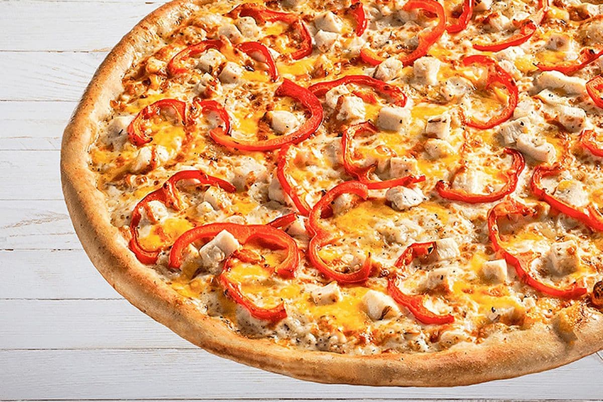 BUTTER CHICKEN FEAST PIZZA