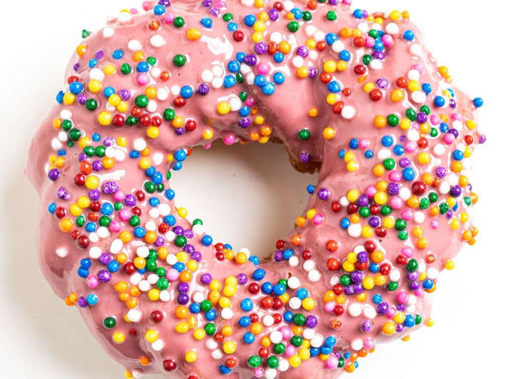Pink sprinkles churro donut