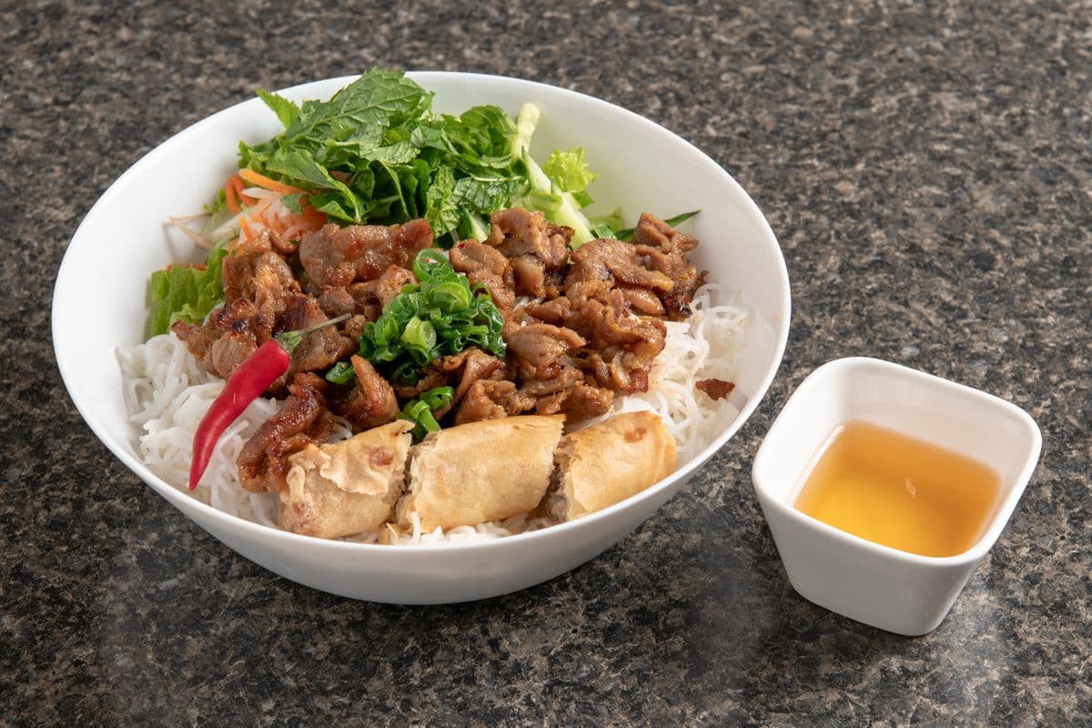 131. Grilled Pork and Crispy Spring Rolls on Vermicelli