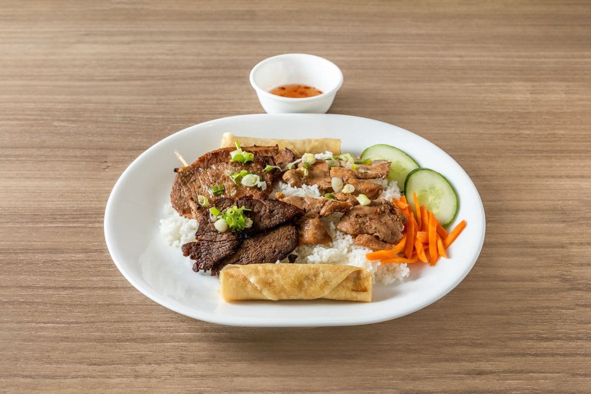 43. Charbroiled Pork, Beef, Chicken, and Spring Rolls on Rice