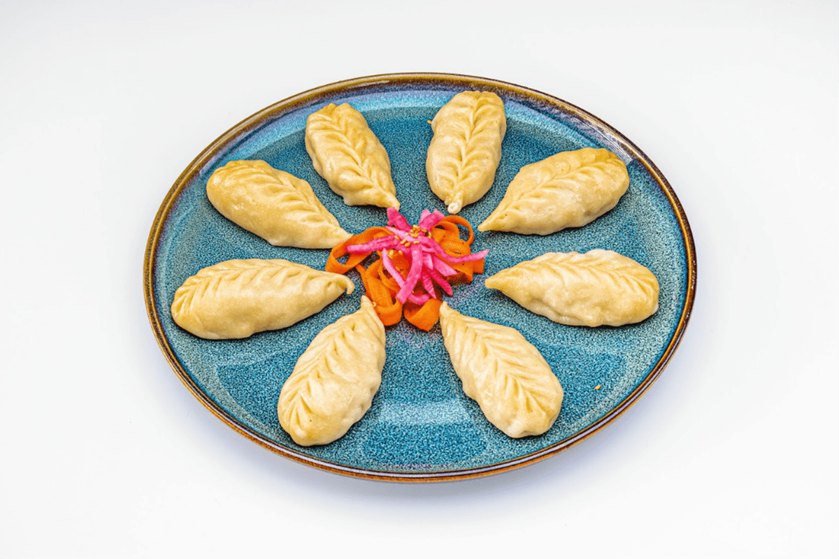 Steamed Momo / རླངས་བཙོས་ག ་ག །