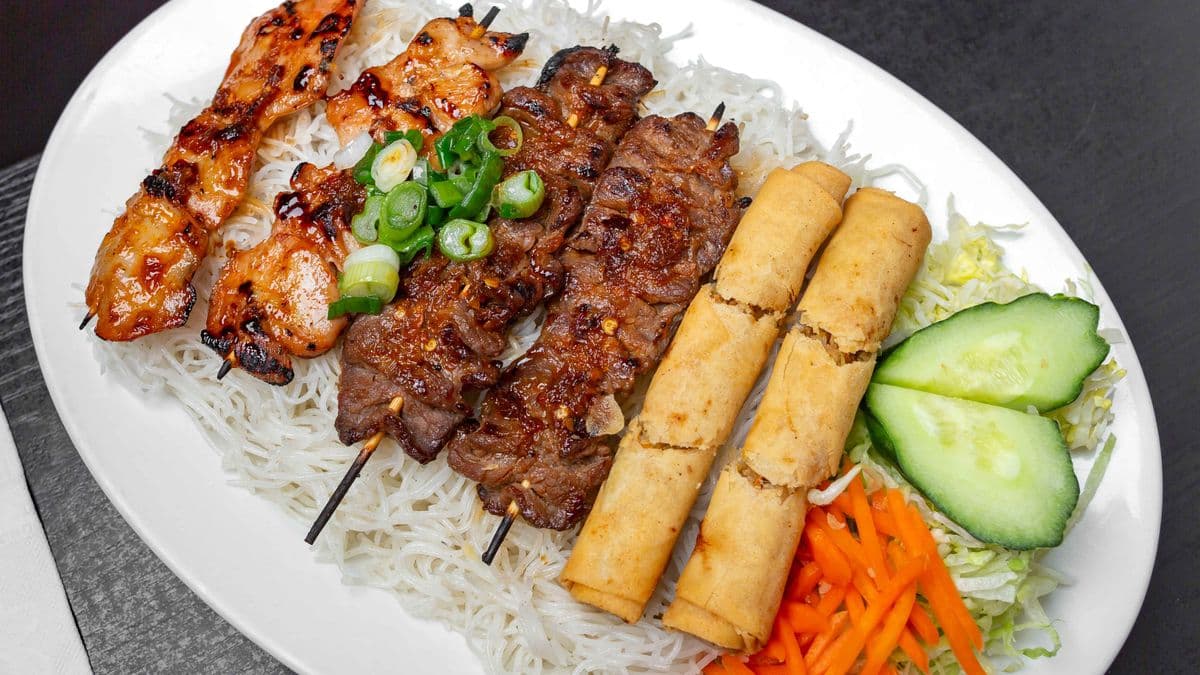 44.Grilled Satay Beef & Chicken Skewers with Spring Rolls on Rice Vermicelli