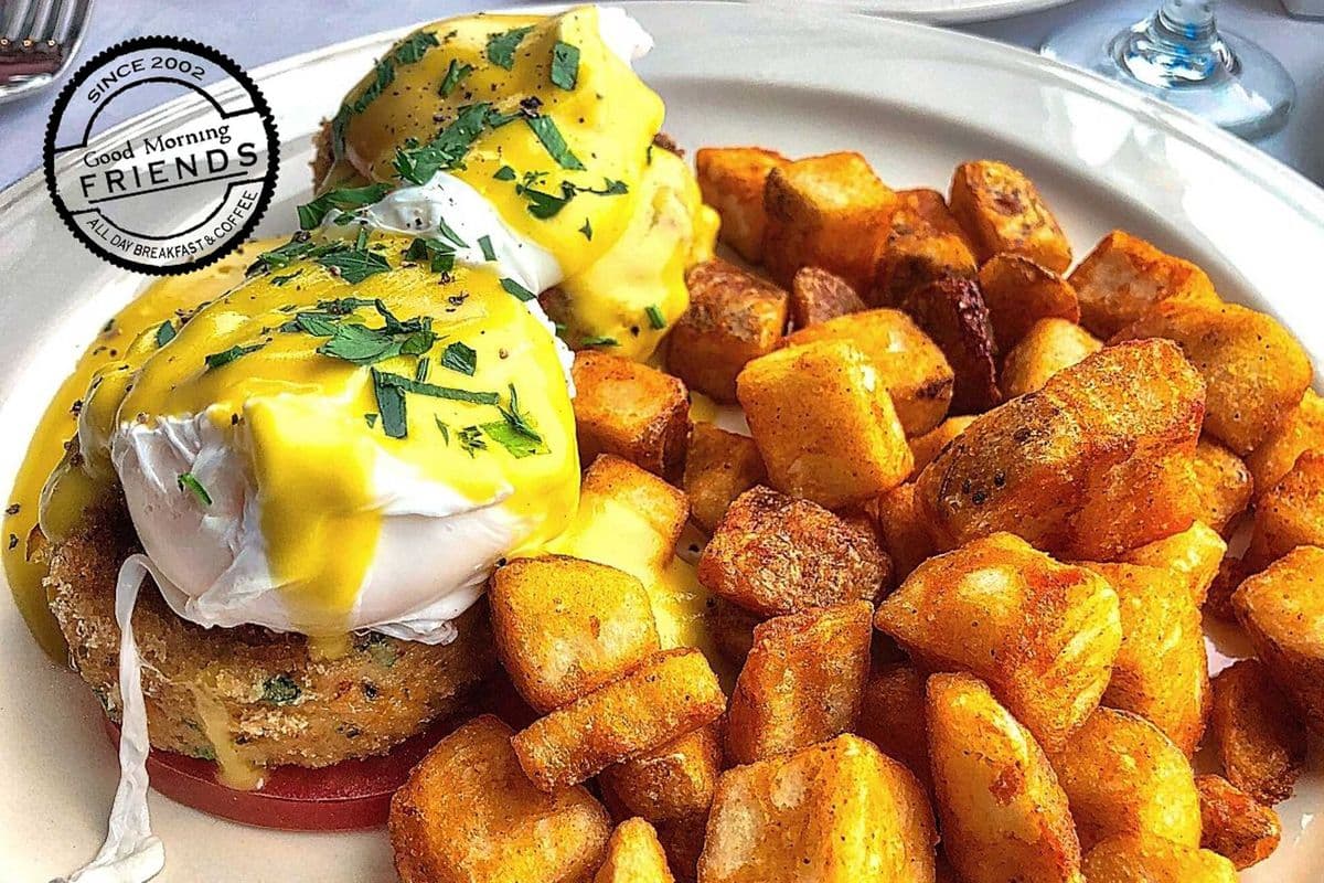 Eggs Benedict with Ham and Skin on Wedge Fries