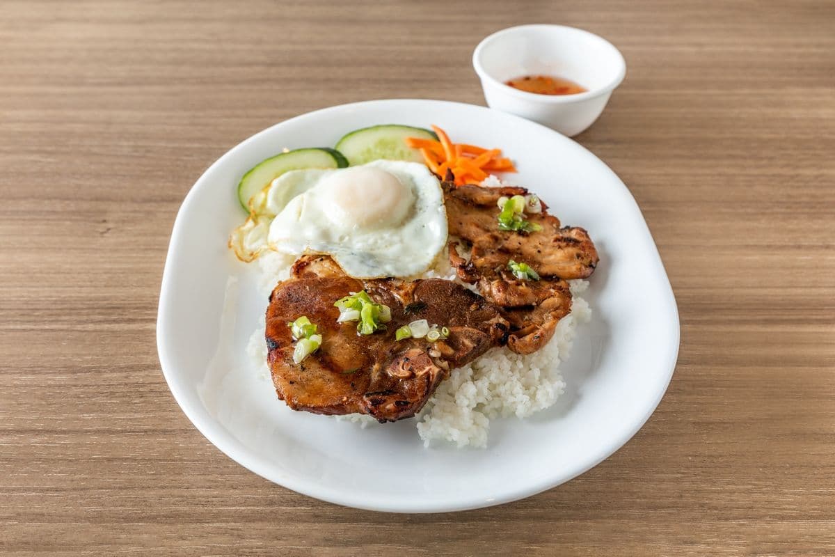 44. Charbroiled Pork Chop, Chicken, and Fried Egg on Rice