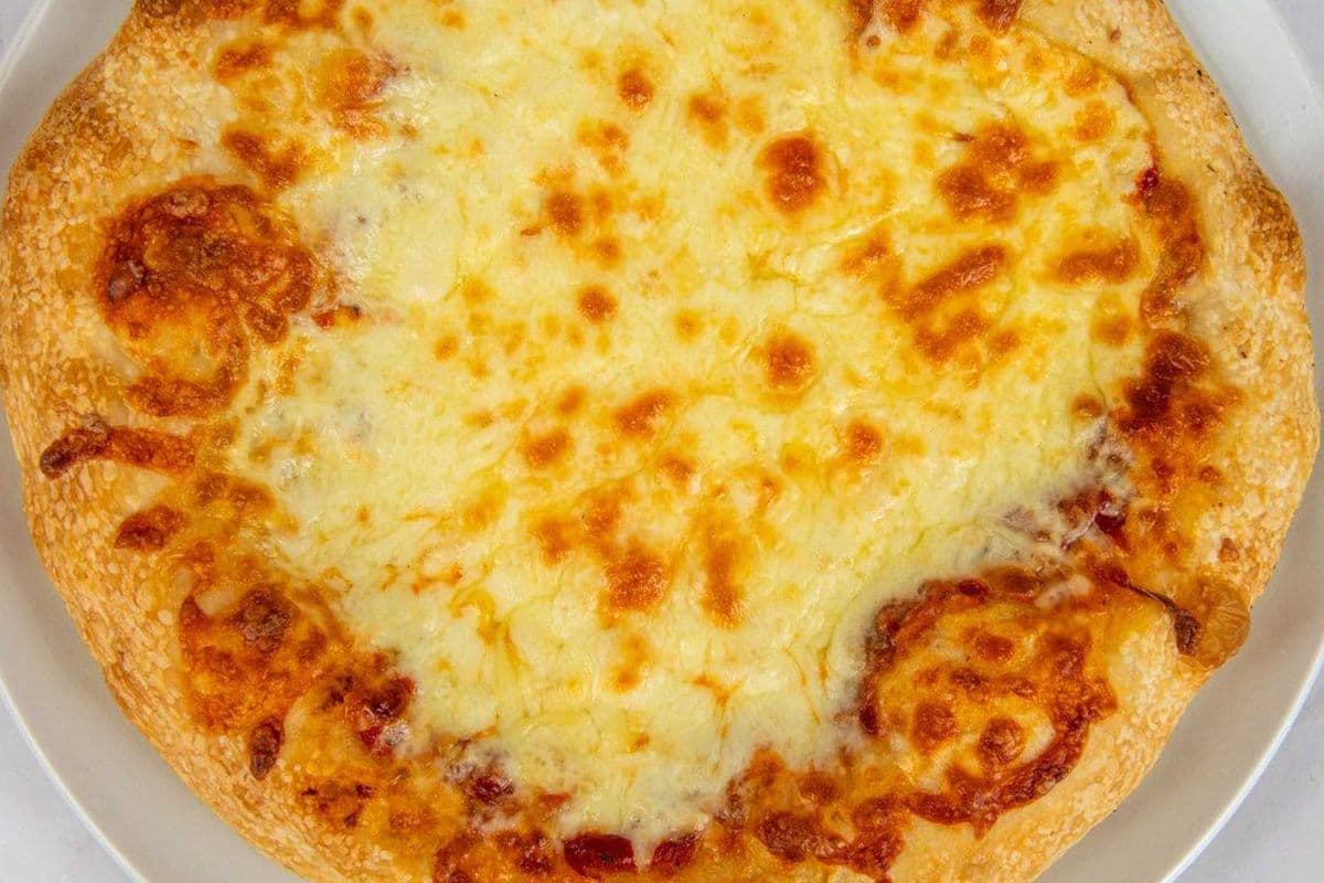 Grande pizza au fromage / Large cheese Pizza
