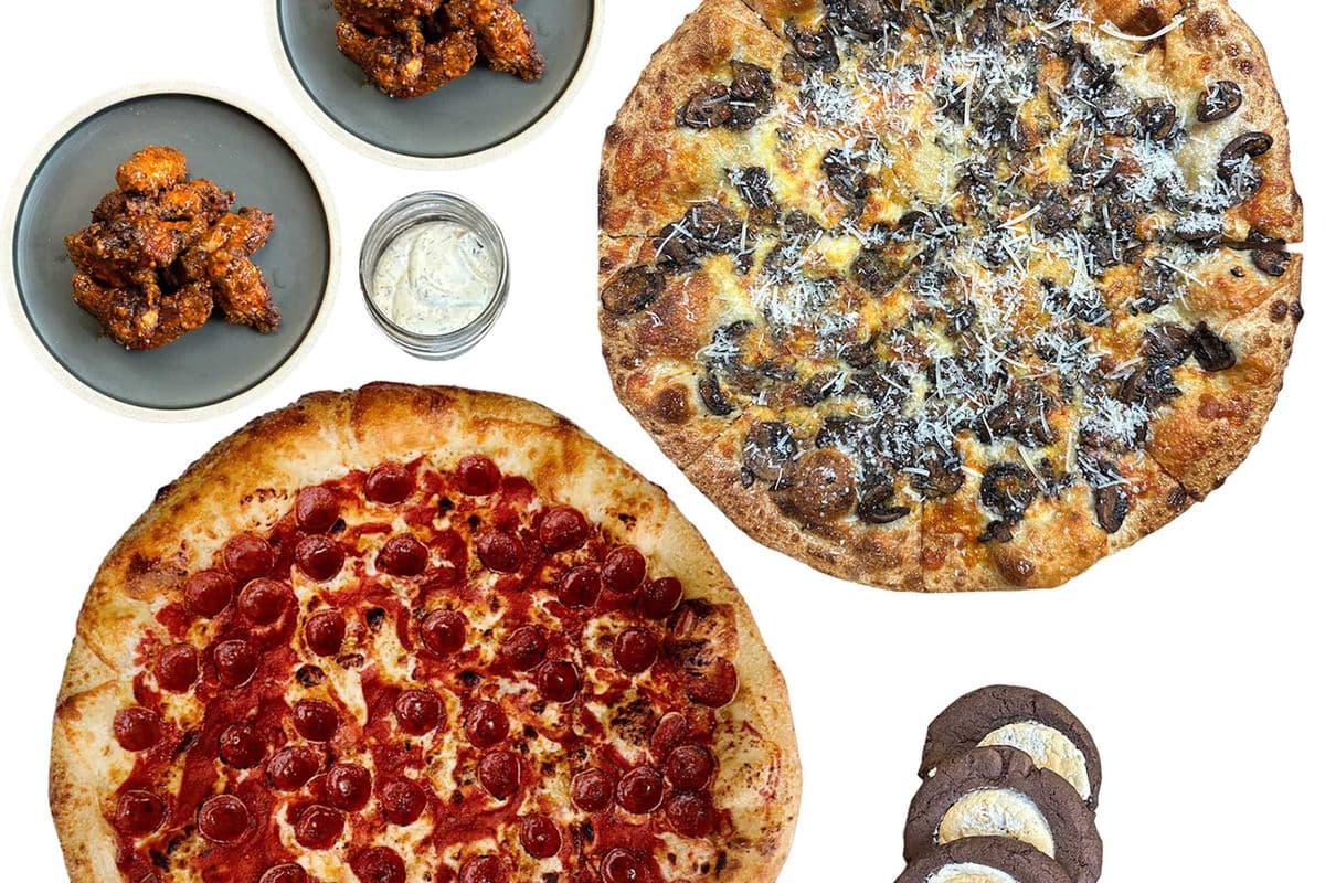 Bundle for 6-8: two 16" NYC Pizzas, 3 Crusty Dips, 2 orders of 9 Spice Chicken Wings, Chocolate Chip Cookies