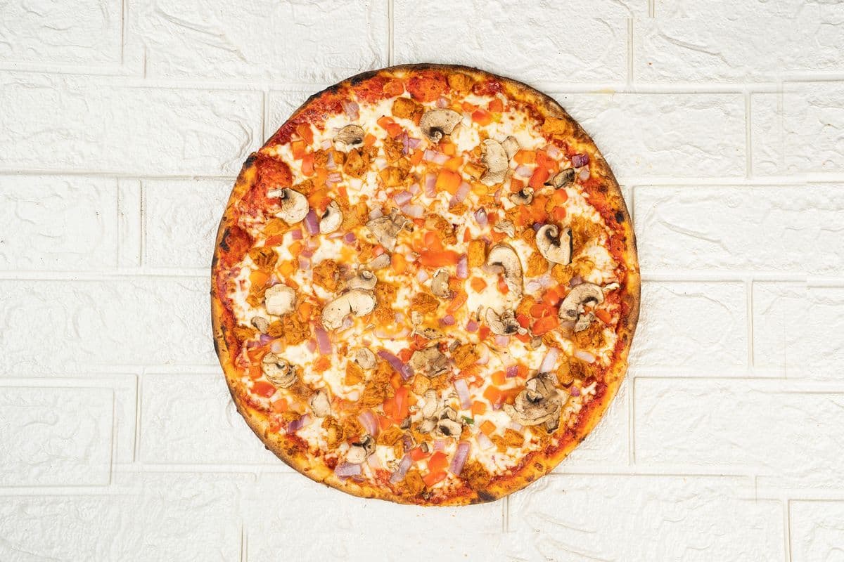 Medium Butter Chicken Pizza