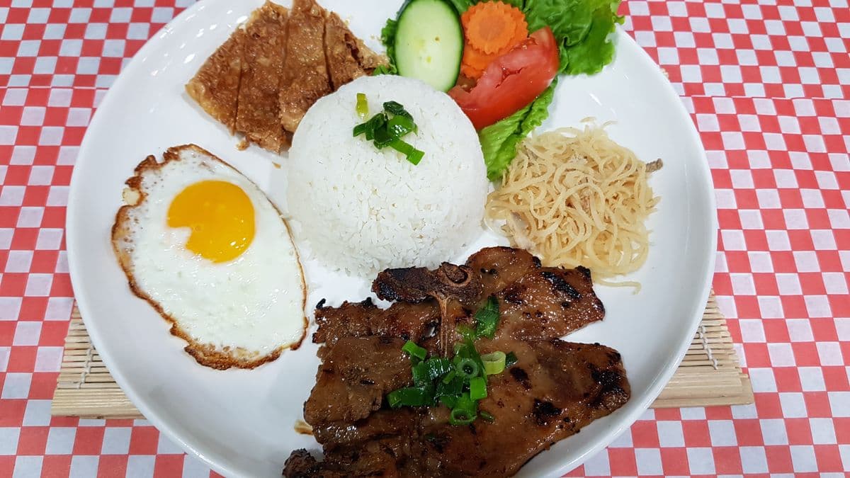 #403. Grilled Pork Chop, Bean Curd Shrimp, Fried Egg, & Spring Roll on Rice (Com suon nuong, tau hu ky tom, trung opla, cha gio)