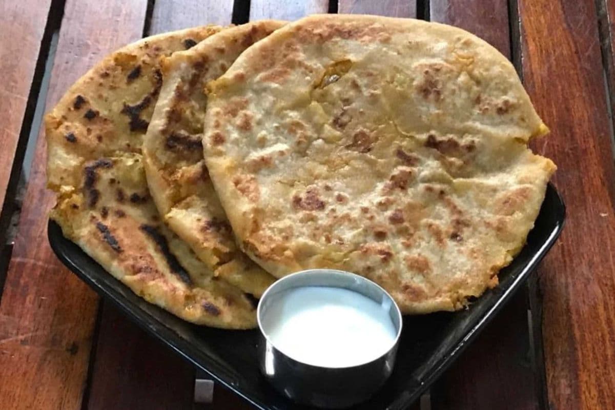 Tandoori aloo paratha with dahi and achar