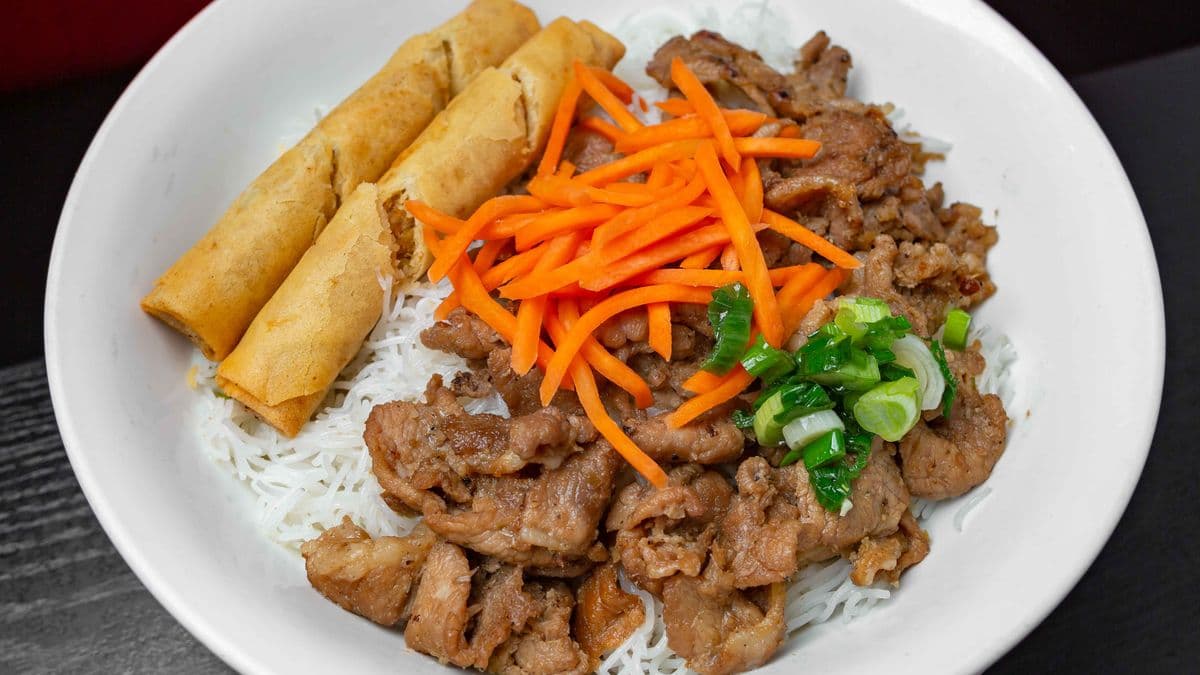 36.Grilled Pork & Spring Rolls on Rice Vermicelli