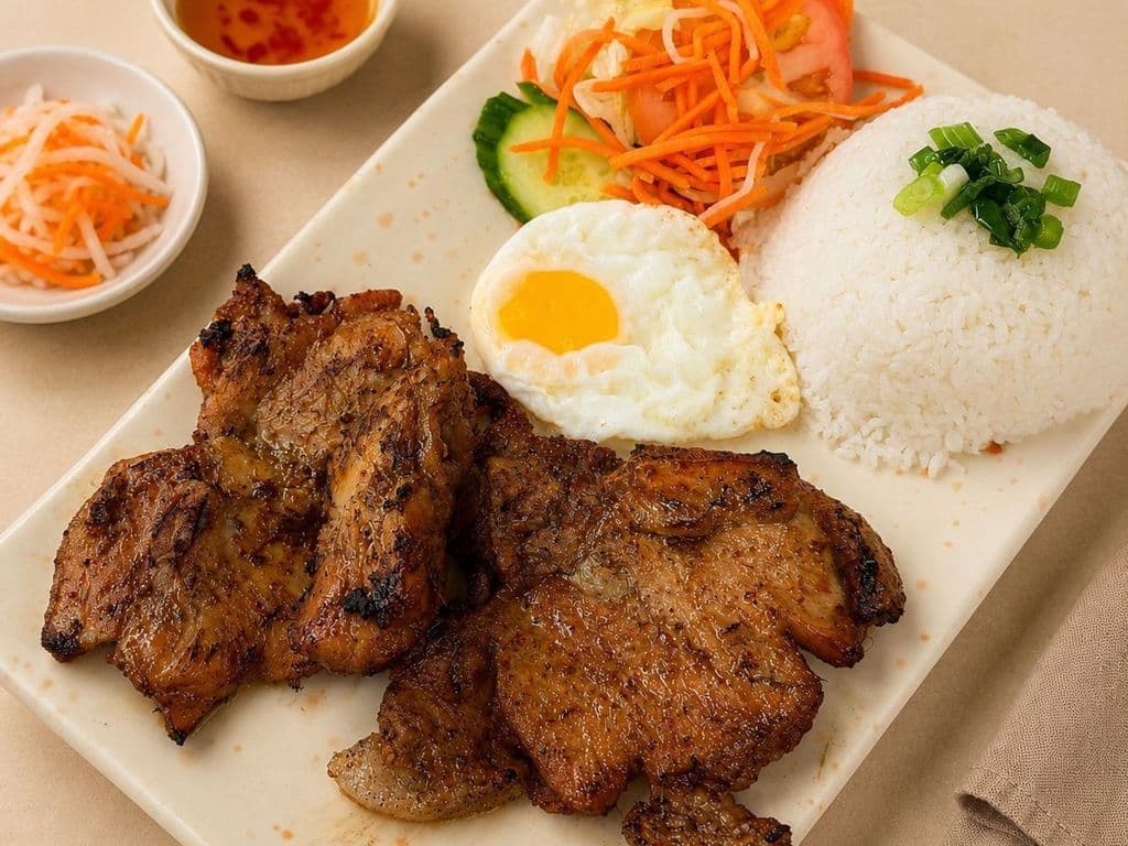 501. Grilled Chicken, Pork Chop and Fried Egg on Rice