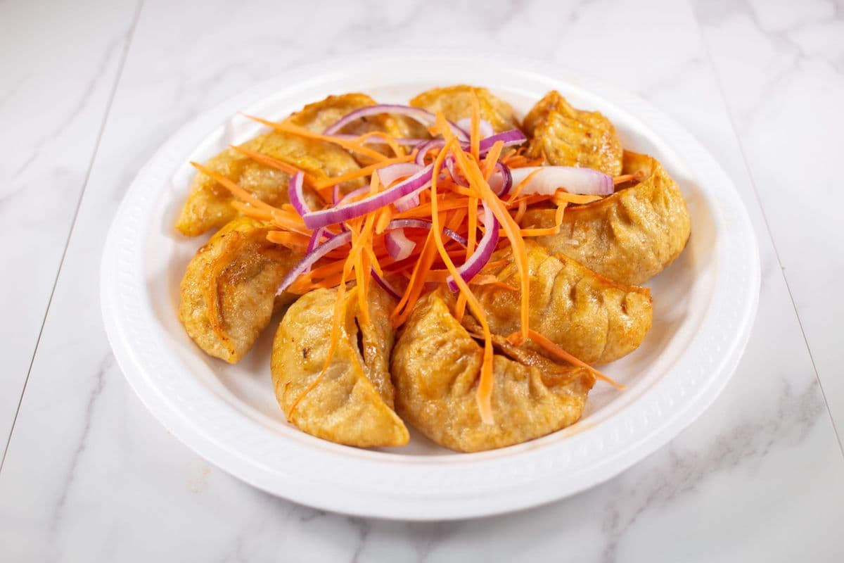 25. Fried Momo (10 pcs)