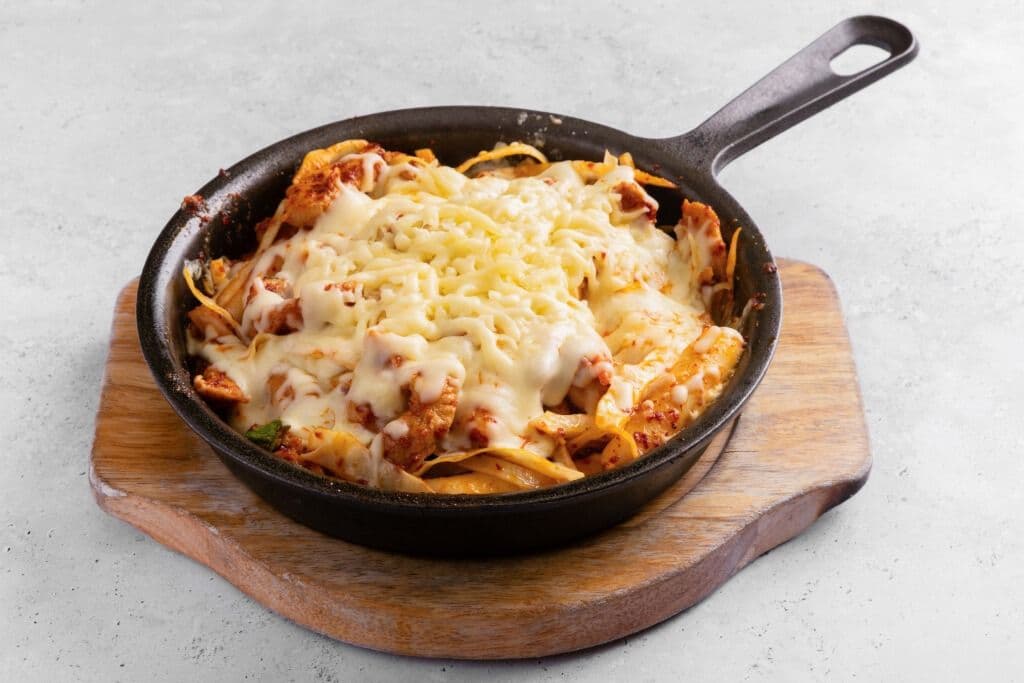 73. Spicy Dduk Cheese Dak Galbi