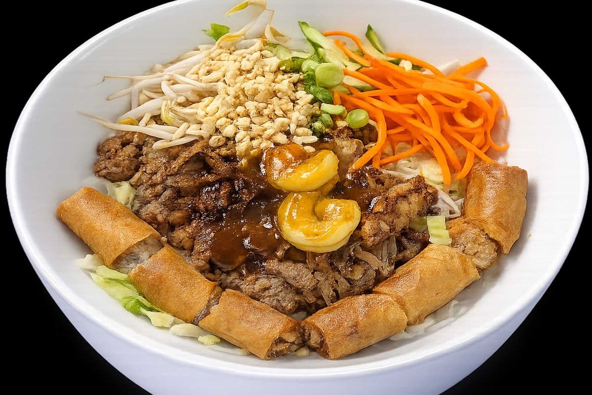 23. Char-Broiled Chicken, Beef, Shrimp, and Spring Rolls on Vermicelli