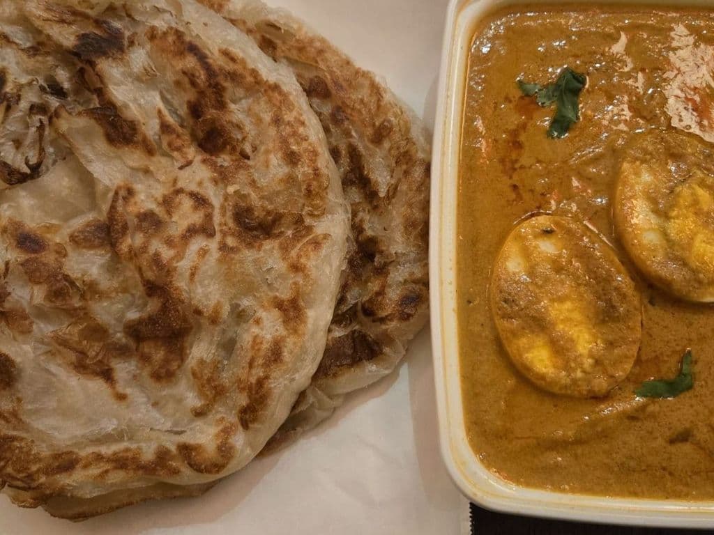 Parotta (2 pcs) with 12 Oz Egg Curry (Non Veg)