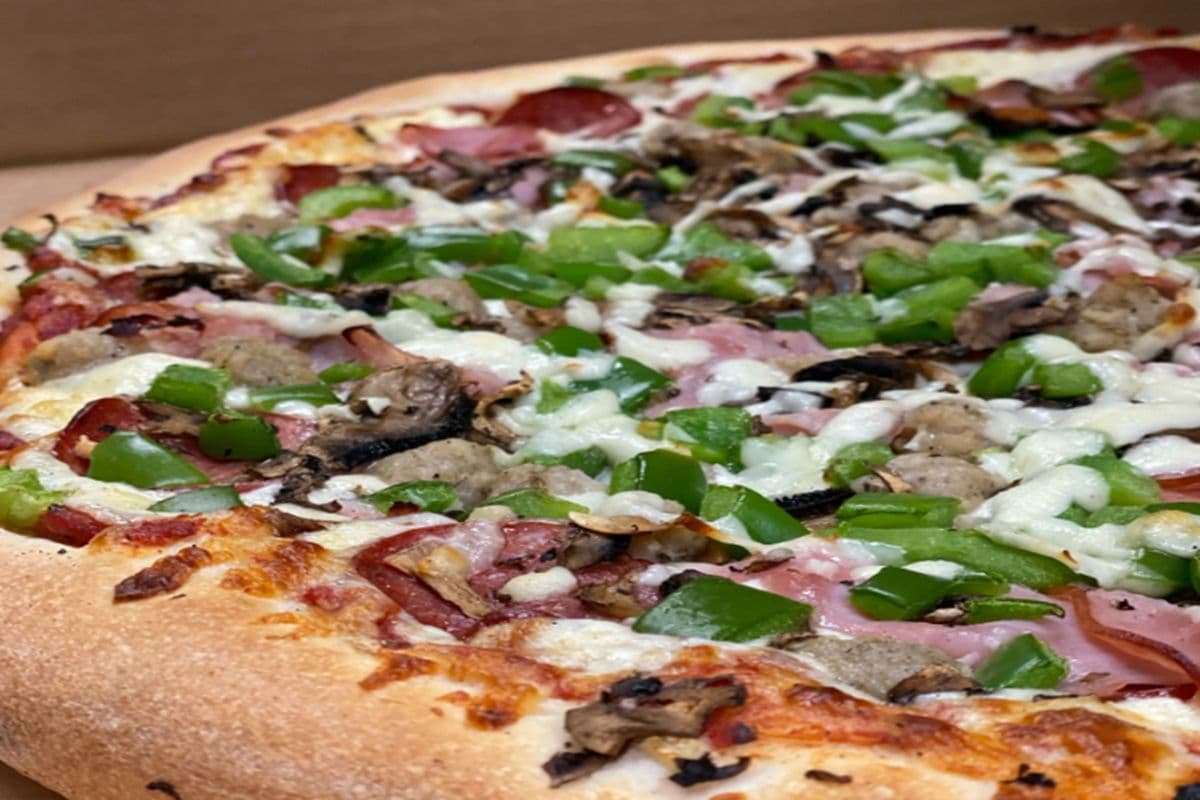 15" Stone-Baked Deluxe Pizza