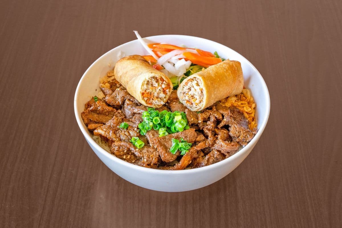 53 Marinated, Grilled Lemongrass Pork Slices & Fried Roll with Veggie