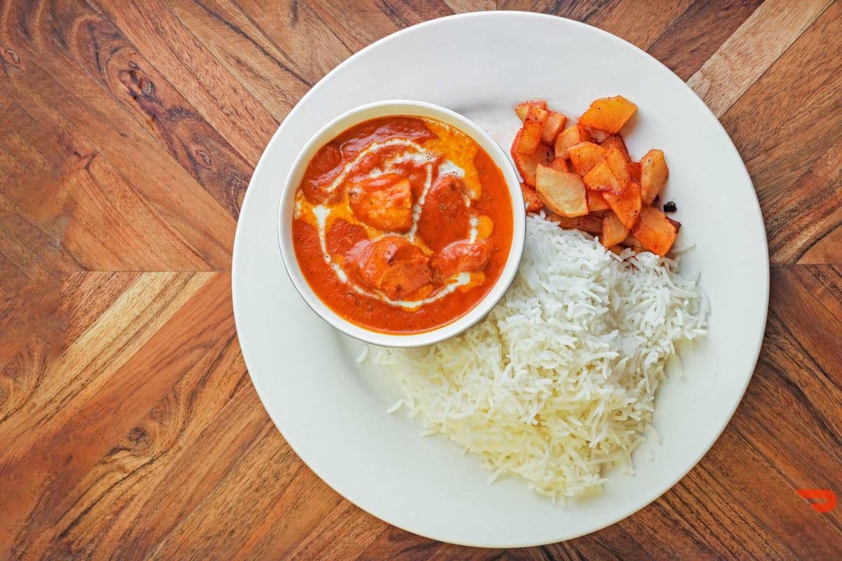 35. B utter Chicken, Rice or Naan, and Tangy Potatoes