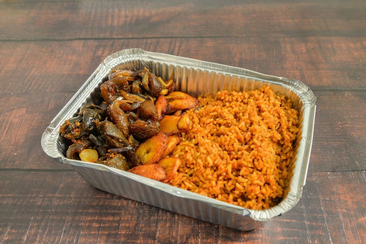 Jollof rice, peppered ponmo and plantain combo